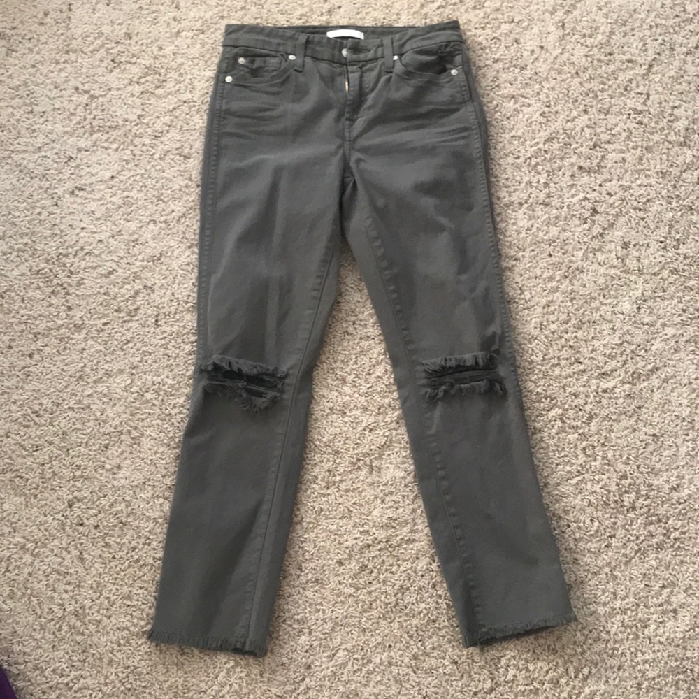 Army green frill jeans with cutouts at knees